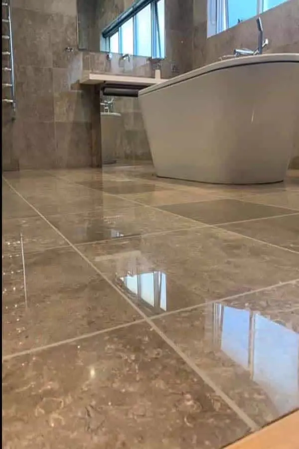 Bathroom stone floor (Stone tiles · full bathroom) — after MarblePro polishing